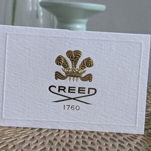 Creed Gold and White Business Card Design